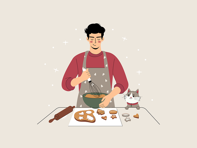 キッチンでフードプロセッサーを使って笑顔で料理をする人
