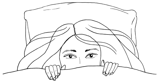 たくさんのブランケットひざ掛けの中からどれを選ぶか悩む人